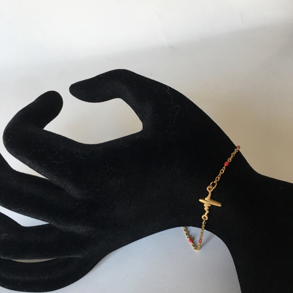 Golden Stainless steel bracelet. Heart beat bracelet